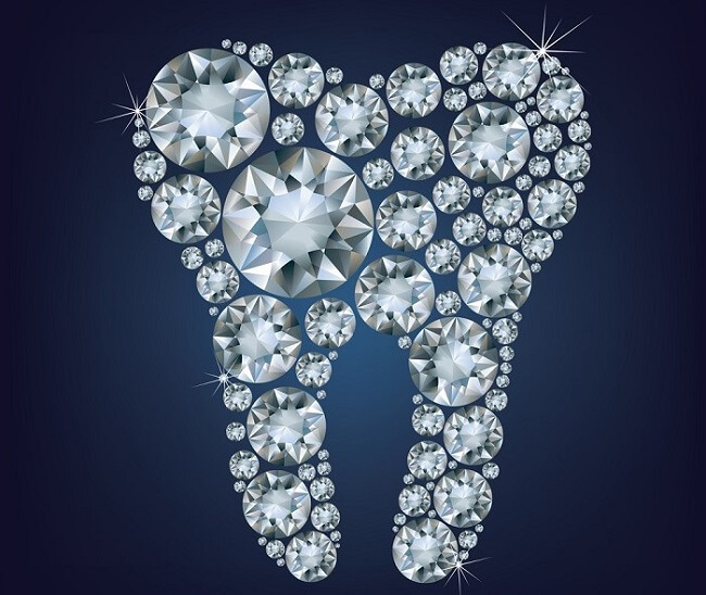 a lot of diamonds positioned to form a tooth shape