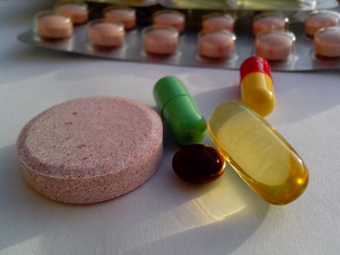vitamins and supplements on a table