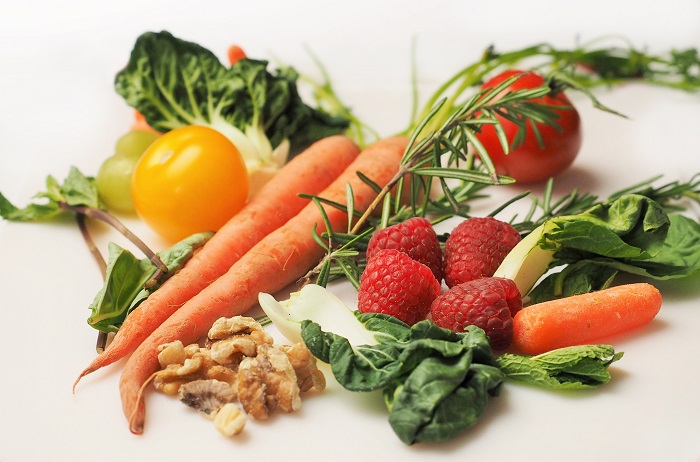 carrots, spinach, walnuts, kale, and other fruits and vegetables 