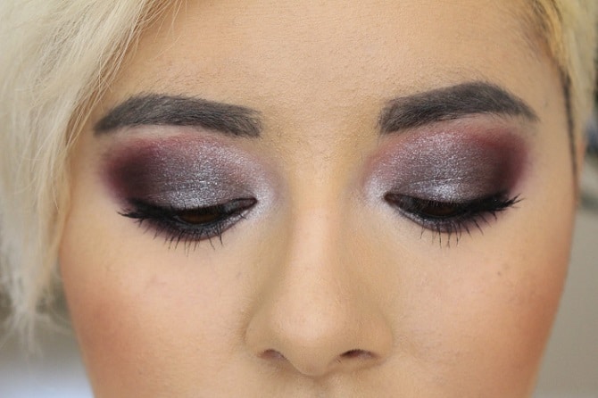 a woman with eye shadow makeup