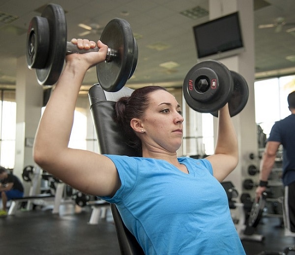 a woman lifting weights