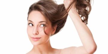1 woman grabbing her hair
