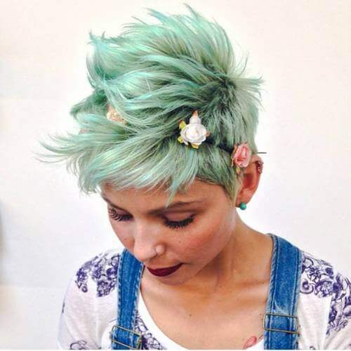 woman with a green long pixie cut