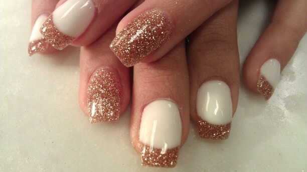 white nails with gold glitter