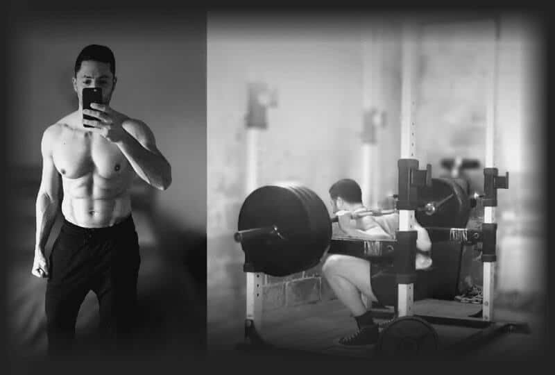 trainer taking picture in the mirror and lifting weights
