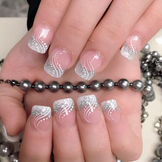 silver and white nail design