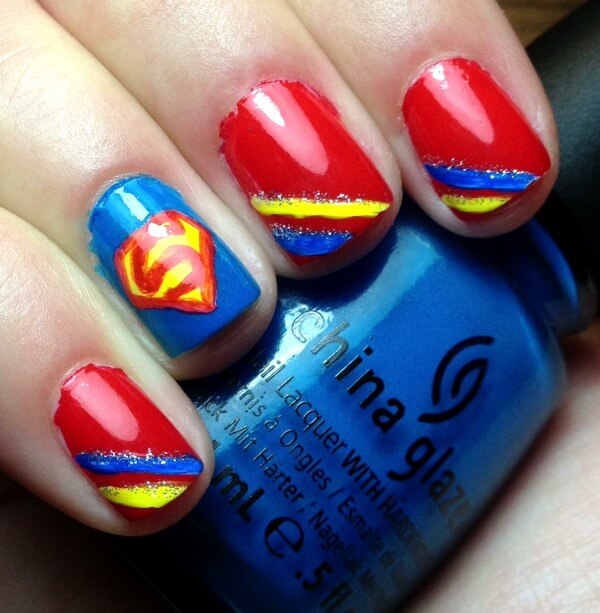 nails with the superman logo 