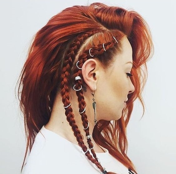 Redhead wearing braid rings