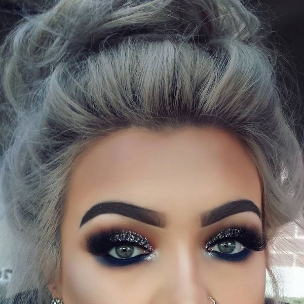 Smoky eye makeup with gray hair