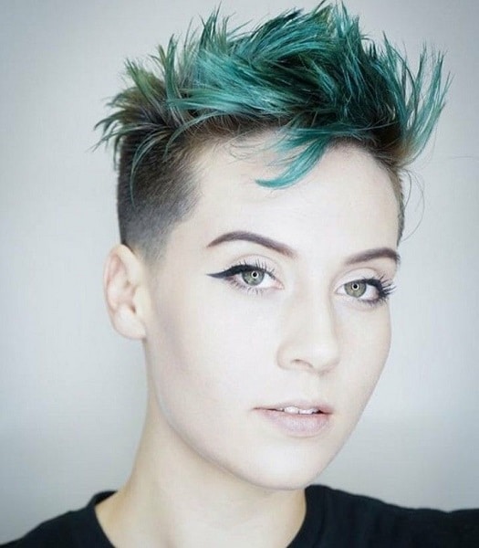 Woman with turquoise pixie cut