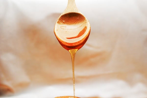 honey falling from a spoon
