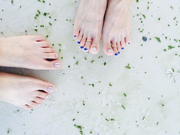 two women's feet enjoying relaxation