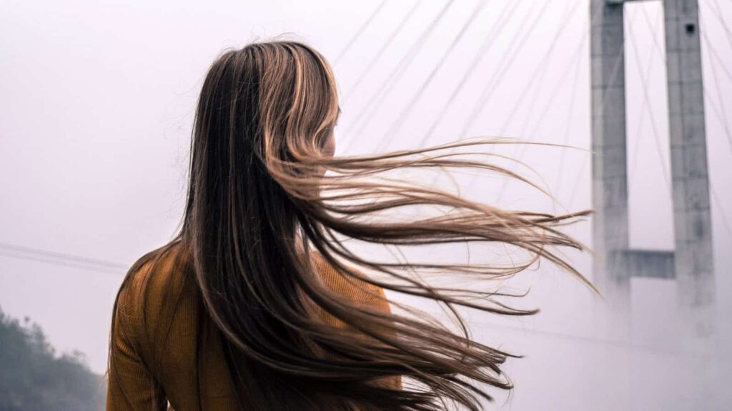 long hair blowing in wind